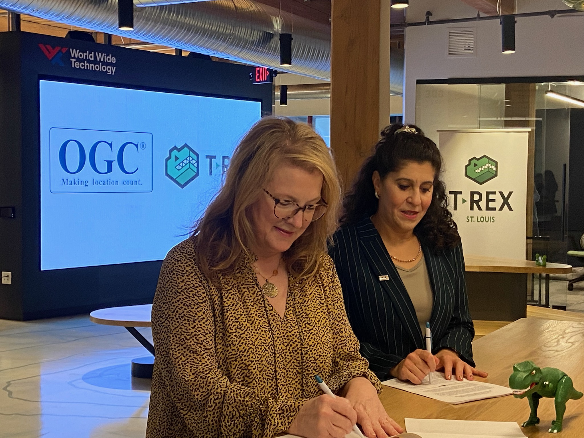 Nadine Alameh, OGC CEO and Patricia Hagen, President & Executive Director of T-REX signing a partnership agreement
